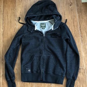 “Roots” Black speckled zip hoodie